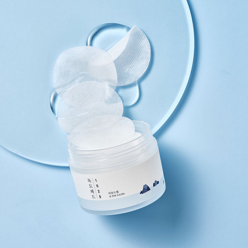 Round Lab 1025 Dokdo Pad 70 Pads is a toner pad from Round Lab that cleanses and nourishes the skin, revealing clean, moisturized, and smooth skin.